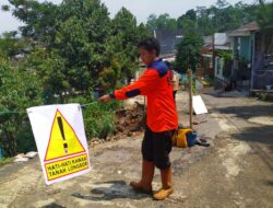 Antisipasi Longsor Susulan, Petugas BPBD Pasang Rambu Pengamanan di Kota Sukabumi